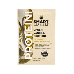 A beige colored sachet of Smart Pressed Juice Vegan Vanilla Proteini, which has cover art containing vanilla bean and star-shaped pod, reading Vegan Vanilla Proteini, Cut Cravings Weight Management, Plant-based & Keto Friendly, Complete Protein from 10 Superfoods, Prebiotics for gut health, single serving packet, 25 grams. Contains the USDA certified organic logo