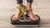 Feet on a weighing scale tied with a measuring tape