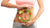 Girl with a salad at her abdomen in a sports bra and leggings